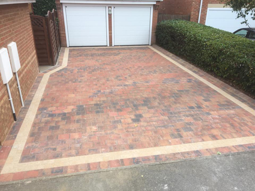 Blocked paved driveway with border